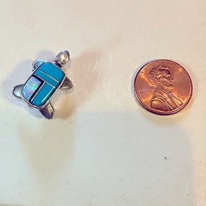 Silver turtle brioche with turquoise and other stone inlay